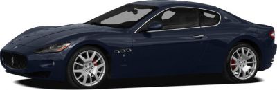 Side profile of sleek Maserati coupe with sporty wheels and streamlined body