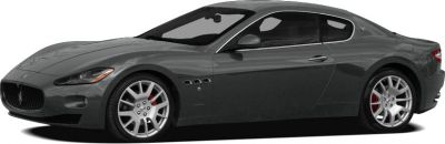 Coupe side profile with alloy wheels