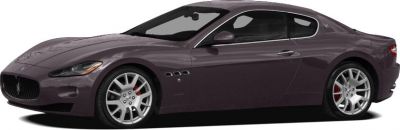 Front-side view of a sleek coupe with alloy wheels and side air vents