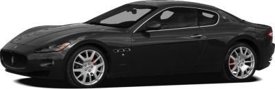Side profile of a sleek black coupe with sporty alloy wheels.