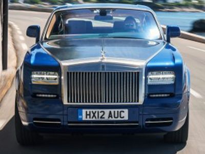 Front grille and headlights of luxury convertible coupe