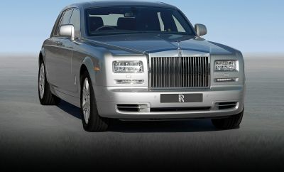 Front view with iconic grille and rectangular headlights