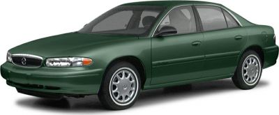 Green sedan with classic front grille and alloy wheels