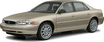 Four-door beige sedan with alloy wheels and streamlined design