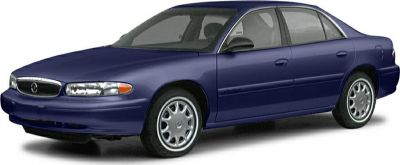 Side front view of a sedan with classic grille and alloy wheels