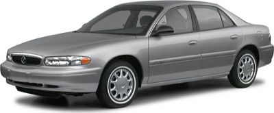 Front-side view of a sedan with round headlights and alloy wheels