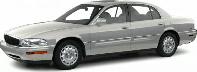 Silver four-door sedan with classic 90s styling, front and side profile view.