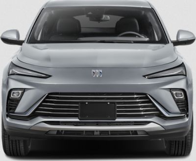 Sleek slim headlights and bold horizontal grille in front view.