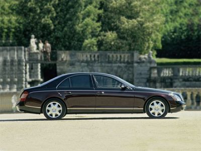 Side profile of elongated luxury sedan with premium design.