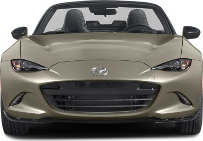 Close-up frontal view with sleek headlights and sporty grille