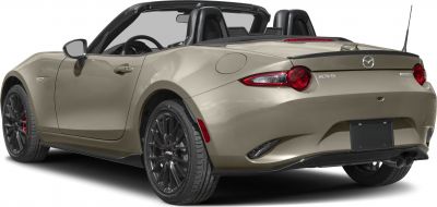 Rear view of a facelift convertible with sporty black wheels and dual exhaust