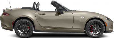 Side profile of a convertible with sporty black multi-spoke alloy wheels and red brake calipers