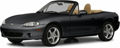 Black convertible roadster with tan interior and alloy wheels