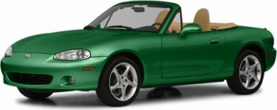 Green convertible sports roadster with tan interior and alloy wheels