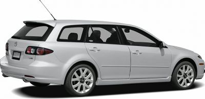 Side and rear view of a station wagon with sporty rear spoiler and modern tail lights