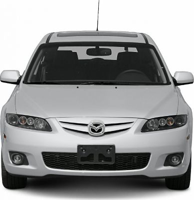 Front view with grille, headlights, fog lights, windshield and mirrors.