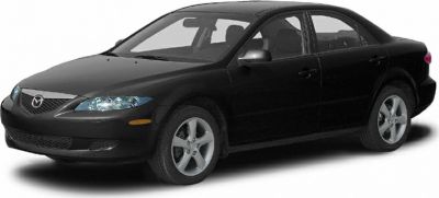 Black four-door sedan with sleek headlights and alloy wheels