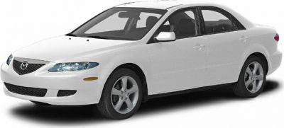 Front side view of a sedan with sleek headlights and alloy wheels