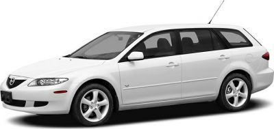 Side profile of a white station wagon with alloy wheels