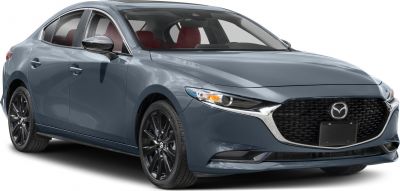 Sleek front grille and LED headlights with black sport wheels on a four-door sedan