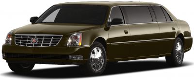 Side view of a long limousine with tinted windows and chrome grille