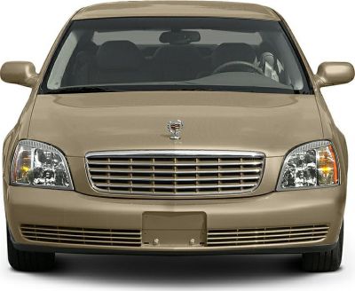 Front view with grille and headlights of a beige luxury sedan