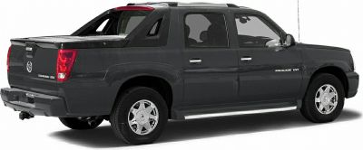 Black pickup truck rear side view with extended cab and chrome details