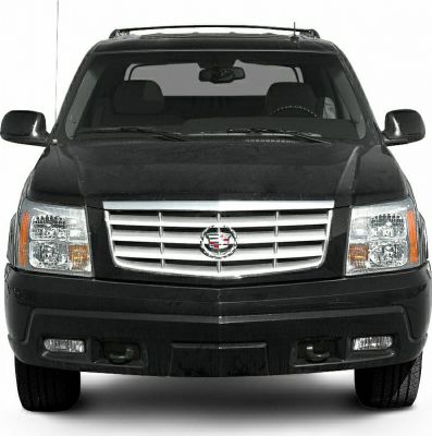 Bold chrome grille and rectangular headlights with robust bumper.