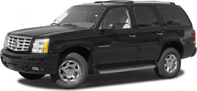 Black 2002 SUV with chrome wheels, side profile view