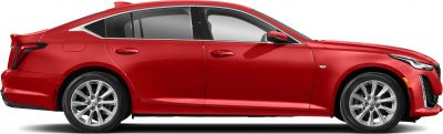 Side view of a sleek red sedan with alloy wheels and sharp design lines