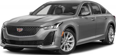 Front angled view with sleek headlights, prominent grille, smooth body lines