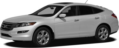 Front side view of white wagon with sunroof and alloy wheels
