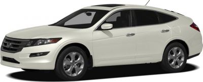 Sleek wagon profile with alloy wheels and front-side view.