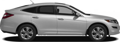 Side profile of a silver 5-door wagon with alloy wheels.