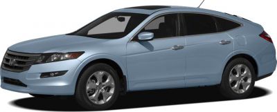 Side view of a sleek sedan with alloy wheels and tinted windows