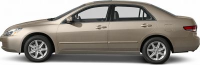 Side profile of mid-size sedan with alloy wheels and classic design.