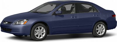 Side profile of a sedan with four doors and alloy wheels