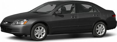 Side profile of a mid-2000s sedan with distinctive body shape and wheel design