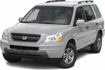 Front view of SUV with prominent grille, headlights, roof rails, and alloy wheels