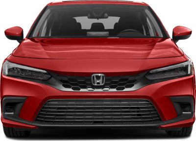 Front view with modern headlights and hexagonal honeycomb grille