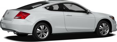 Side rear view of white coupe-style vehicle with alloy wheels