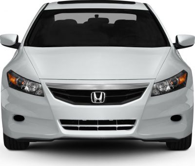 Front view showing grille and headlights design