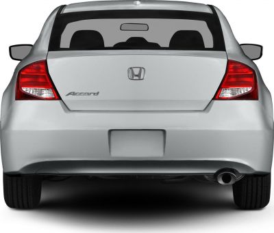 Rear view with visible tail lights, exhaust pipe, and rear window