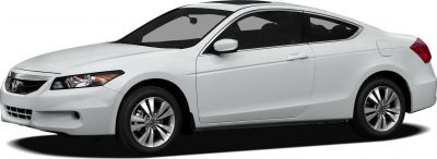 White 2-door coupe with alloy wheels and sleek aerodynamic design