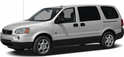 Side view of minivan with sliding doors and alloy wheels