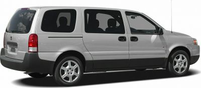 Side view of van with sliding doors and alloy wheels