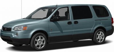 Side profile of a minivan with sliding rear doors and alloy wheels