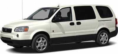 Front side view of 2005 minivan with sliding doors and alloy wheels