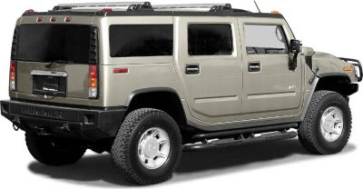 Side and rear view of rugged SUV with boxy design and large tires