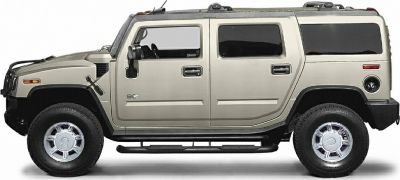Side profile of rugged, boxy SUV with large wheels and strong stance
